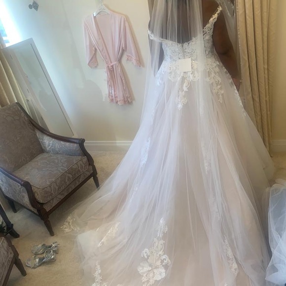 Worn once!!! This beautiful Stella York gown is perfect. - Picture 4 of 4